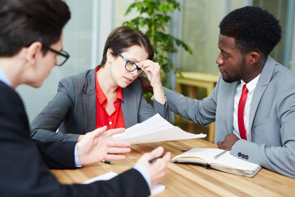 Attorney explaining Michigan criminal law and defense options to a client facing criminal charges.